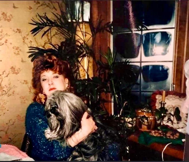 Darcy Ellen holding her dog