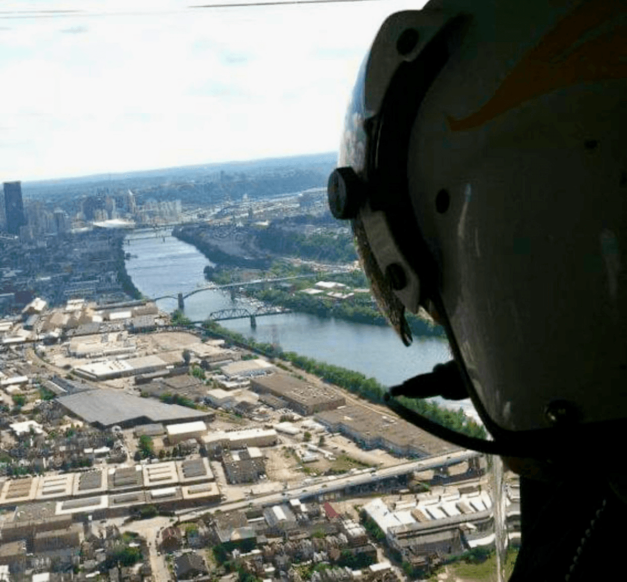 Flight helmet with Pittsburgh in the background